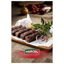 Traditional Romanian mici mititei boieresti by Marcel, grilled sausages with herbs and spices, served on a plate.