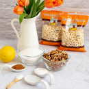 Traditional Mucenici Baneasa sweet pastry from Baneasa, shown in a close-up image highlighting its golden-brown, spiral shape.